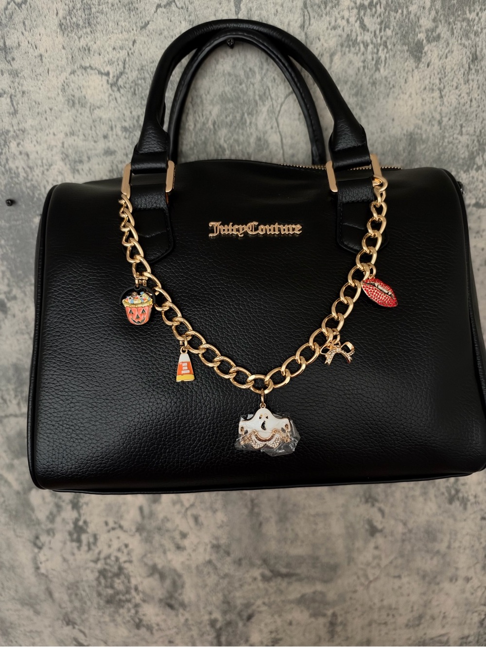 Juicy Couture Black Satchel with Gold Chain Charm Accents